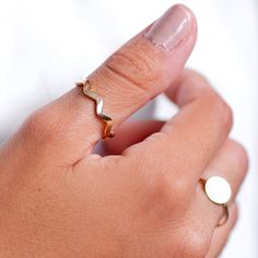 Wedding Band, Zig Zag Ring, Chevron Ring, Wavy Ring, 14K Gold Ring, 14K Gold Band, Dainty Gold Ring, Wavy Band, Stacking Ring Gold, Solid Gold Ring, Stackable Ring C L O S E R ∙ L O O K An alternative wedding ring. An elegant and dainty wavy ring made of 14K solid gold. 100% handcrafted with love! D E T A I L S ● Metal: 14K solid gold, 14K white gold or 14K rose gold ● Band width: 3mm R I N G ∙ S I Z I N G For General Reference: ● we use standard US Ring Sizing ● an average women's ring finger i Gold Wavy Rings For Gifts, Wavy Gold Rings For Gift, Gold Wavy Promise Ring, Yellow Gold Wavy Ring For Anniversary, Gift Wavy Stackable Rings, Gift Stackable Wavy Rings, Wavy Yellow Gold Anniversary Rings, Anniversary Yellow Gold Wavy Rings, Gold Wavy Rings For Anniversary