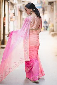 Peach, pink saree with floral, sequin, cutdana embroidery. Comes with unstitched blouse piece.
Components: 2
Pattern: Embroidered
Type Of Work: Floral
Fabric: Chiffon
Color: Pink, Peach
Other Details: 
Floral embroidery
Note: The stitched blouse worn by the model is not for sale
Occasion: Destination Wedding - Aza Fashions Pink Tissue Silk Pre-draped Saree With Unstitched Blouse, Pink Pre-draped Tissue Silk Saree With Unstitched Blouse, Pink Silk Bollywood Pre-draped Saree, Pink Pre-draped Saree With Dupatta In Tissue Silk, Festive Pink Dola Silk Blouse Piece, Designer Pink Dola Silk Pre-draped Saree, Pink Art Silk Saree For Reception, Pink Bollywood Pre-draped Saree With Resham Embroidery, Pink Tissue Silk Blouse With Traditional Drape