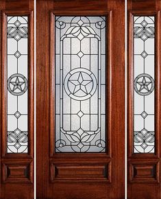 three doors with stained glass panels on them