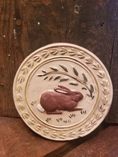 a ceramic plate with a rabbit on it