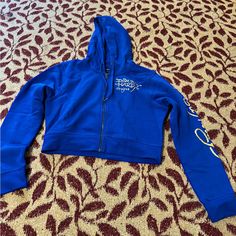 Ed Hardy Hoodie New With Tags Blue Stretch Casual Sweatshirt, Blue Casual Stretch Sweatshirt, Casual Blue Stretch Sweatshirt, Casual Stretch Blue Sweatshirt, Blue Stretch Hooded Tops, Blue Stretch Sweatshirt For Spring, Blue Fitted Hoodie For Fall, Blue Fitted Casual Hoodie, Fitted Blue Hoodie For Fall