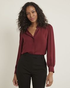 Light and flowy, this silky crepe buttoned-down blouse is the perfect everyday top for both your professional and casual occasions.   Fit & Cut - Button-down blouse - Long sleeves with buttoned cuffs - 26" front body length (size M)  Design Details - Silky crepe: contains 60% recycled polyester* - Unlined - Band neckline - Shirred cuffs and shoulders - Hidden buttoned placket  * This garment contains recycled polyester made out of a mix of bottles and fabric waste. Maroon Blouse, M Design, Crepe Blouse, Feminine Blouses, Paris Outfits, Grey Pants, Style Expert, Long Blouse, Plus Size Blouses