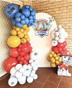 balloons are arranged in the shape of paw patrol characters