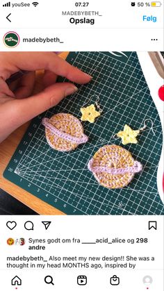 someone is making earrings out of beads on the sewing machine and then using them to sew