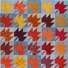 an image of a quilt made with many different colors