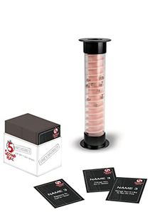 a pink substance in a test tube next to four cards and a black box on a white background