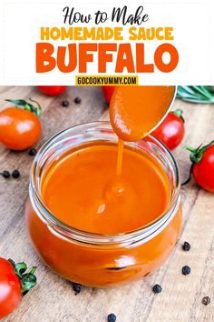 homemade sauce being poured into a glass jar with tomatoes in the background and text overlay reading how to make homemade sauce buffalo