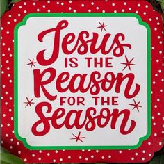 a red and green christmas sign with the words jesus is the reason for the season