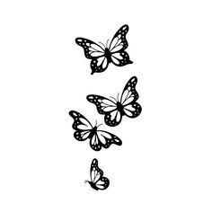 three butterflies flying in the air with one on its back and another on its side