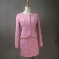 Elevate your ensemble with our exquisite Pink Tweed Skirt Suit, now available in custom-made options for plus sizes and petite sizes. This charming suit features a pink tweed skirt paired with a matching jacket adorned with delicate flower buttons, perfect for wedding guests, personalized gifts, or Easter parties where you want to exude feminine elegance and style. Features: Custom Made: Each suit set is meticulously crafted to your specific measurements, ensuring a flawless fit that accentuates Pink Suits Women, Pink Tweed Skirt, Tweed Skirt Suit, Feminine Skirt, Tweed Suit, Pink Tweed, Guest Attire, Tweed Suits, Pink Party