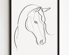 a line drawing of a horse's head in black and white on a wall