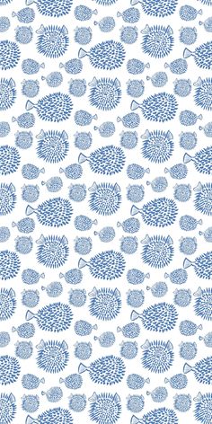 a blue and white fish pattern on a white background