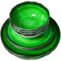 a stack of green plates sitting on top of each other