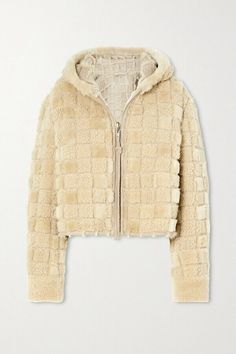 100% lamb shearling. Fur Origin: Spain. Made in Turkey. Professional leather clean only. Front zip closure with long suede pull. Check motif with alternating shaggy and plush fur texture. Unlined, genuine shearling. This item is not available for international export.  Acne Studios Jacket in Beige 100% lamb shearling. Fur Origin: Spain. Made in Turkey. Professional leather clean only. Front zip closure with long suede pull. Check motif with alternating shaggy and plush fur texture. Unlined, genuine shearling. ACNE-WO279. A70110.  About the designer: Acne Studios is a Stockholm-based fashion house with a multidisciplinary approach. Through founder and Creative Director Jonny Johansson’s interest in photography, art, architecture and contemporary culture, an alternative path has been found, Luxury Long Sleeve Shearling Outerwear, Luxury Hooded Shearling Outerwear, Designer Sheepskin Outerwear, Designer Shearling Outerwear With Long Sleeves, Designer Shearling Long Sleeve Outerwear, Cream Shearling Long Sleeve Outerwear, Designer Long Sleeve Sheepskin Outerwear, Designer Cream Outerwear For Winter, Acne Studios Jacket