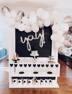 an image of balloons and confetti on the table