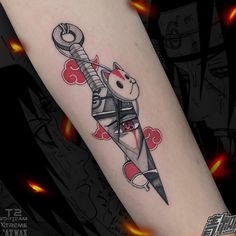 a cat tattoo on the arm with a rocket ship in it's center piece