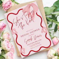 a pink and red bridal shower party with roses