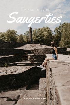 a woman sitting on the edge of a stone wall with text overlay reading things to do in saugrites