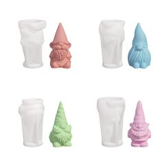 six different colored plastic gnomes sitting next to each other