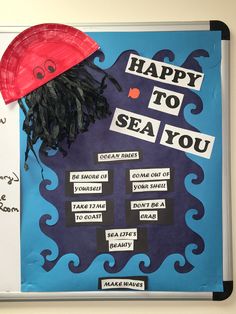 a piece of paper that says happy to sea you with a red hat on it