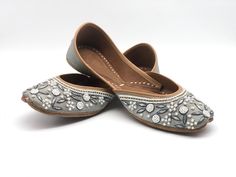 Ethnic Indian/Pakistani style shoes durable, hand stitched with genuine leather sole and leather padded cushion inside. This elegant shoe is meant to be wore on a fancy night out! Perfect for your fancy events, yet simple enough for everyday wear. Sizes available US 6,7,8,9,10. Bridal Collection. Shipped from USA Closed Toe Flats With Handwork For Summer, Embroidered Leather Flats With Flat Heel, Embroidered Leather Slip-on Flats, Leather Embroidered Flats, Festive Embroidered Leather Flats, Handwork Leather Closed Toe Flats, Handwork Leather Closed-toe Flats, Leather Closed Toe Flats With Handwork, Handmade Traditional Slip-on Flats