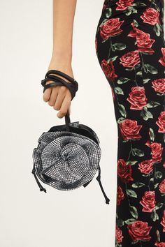 The Magda bag is Magda Butrym's iconic handbag: a bucket bag adorned with large 3D roses on either side of the body, and a leather crossbody strap. The crystal version adds a signature element of Magda DNA through its sparkling, crystal-covered flowers. Exterior: 80% Satin (72% Viscose 28% Silk) 10% Calf Leather 10% Nappa Lamb. Flower 100% Silk. Crystals. All handbags and accessories are considered final sale and may not be returned or exchanged. PLEASE NOTE ALL SALE ITEMS ARE FINAL SALE Magda Butrym, Online Fashion Store, Brand Store, Online Fashion Stores, Luxury Clothing, Ulla Johnson, Luxury Outfits, Crossbody Strap, Official Store