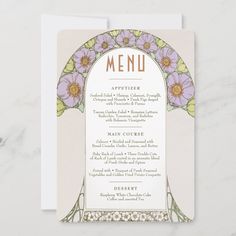 a menu card with flowers on it