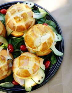 a plate filled with bread and vegetables on top of a table