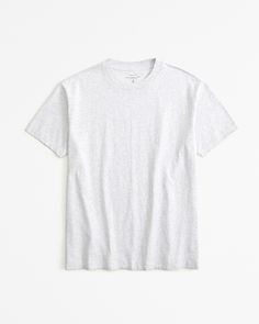 Easy-fitting short-sleeve tee in our heavyweight softAF fabric with a biopolish finish, that creates a clean and crisp feel to the touch. Features an oversized-fit silhouette, crew neckline and straight hem. Cozy Evening, Grey Material, Women Essentials, Grey Tee, Boyfriend Tee, Oversized Silhouette, Grey Top, Oversized Tee, Casual Wardrobe