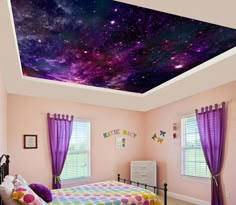 a bed room with a neatly made bed and a sky mural on the wall above it