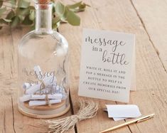 a message in a bottle next to a note and pen