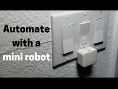 an automatic light switch with a mini robot attached to it's side and the words, automate with a mini robot