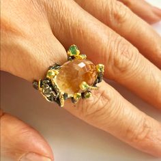 Main Stone: Citrine; Small Stones: Emeralds; 925 Sterling Silver; Black Radium Plated; Parts: Yellow Gold Plated; “Fly” Design. Size: 6 Elegant Citrine Rings With Natural Stones, Unique Citrine Rings With Gemstone Accents, Unique Yellow Citrine Jewelry, Handmade Yellow Citrine Rings, Luxury Handmade Yellow Rings, 925 Silver Ring, Lemon Quartz, 925 Silver Rings, Womens Jewelry Rings