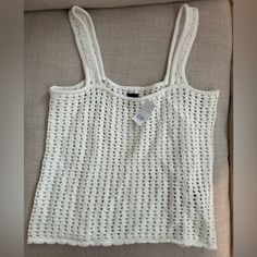 New With Tags. Beautiful Crochet Tank Top. Cotton 100%. Machine Wash, Lay Flat To Dry. Fitted White Open Knit Tank Top, White Gap Tank Top For Summer, White Pointelle Knit Tank Top For Summer, White Gap Tank Top For Spring, White Crochet Tank Top For Spring, White Knitted Tank Top For Summer, White Cotton Tank Top By Gap, White Casual Tank Top By Gap, White Open Knit Cotton Tank Top