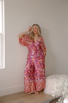 paisley print boho jumpsuit Bohemian V-neck Jumpsuits And Rompers For Brunch, Bohemian Printed V-neck Jumpsuits And Rompers, Spring Matching Set Long Sleeve Jumpsuits And Rompers, Spring Long Sleeve Matching Set Jumpsuits And Rompers, Bohemian Printed Jumpsuits And Rompers For Spring, Spring Loungewear Jumpsuits And Rompers, Flowy Fit, Spring Flowy Loungewear Jumpsuits And Rompers, Flowy Spring Loungewear Jumpsuits And Rompers, Pink Bohemian Jumpsuits And Rompers For Vacation