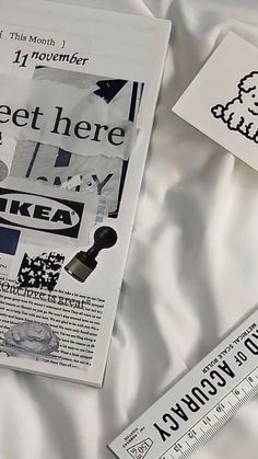 an image of a newspaper with stickers on it and another piece of paper next to it