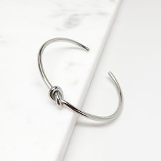 Delicate Bracelets for Women, Dainty Bracelets for Women, Tie the Knot Bracelet, Minimalist Bracelets ♥ Material: Hypoallergenic and Non Tarnishing Stainless Steel, High Quality and Long Lasting Color ♥ Color: Silver, Gold ♥ Width: 2.5 inches (63 mm) / Adjustable Cuff For Rose Gold -> https://www.etsy.com/listing/849684570 ♥ Thickness: 2.9 mm - for thinner 2.0 mm thickness: https://www.etsy.com/listing/733932305 - for thicker 3.8 mm thickness: https://www.etsy.com/listing/843125959 ♥ Gift Box Modern Stainless Steel Bracelets For Wedding, Modern Stainless Steel Bracelet For Wedding, Adjustable Hypoallergenic Minimalist Bangle, Hypoallergenic Adjustable Minimalist Bangle, Adjustable Bangle Bracelets For Bridesmaid Gift, Silver Bangle Bracelets For Bridesmaid Gift, Silver Cuff Bracelet Bangle For Bridesmaids, Silver Cuff Bracelet For Bridesmaid Gift, Silver Cuff Bangle For Bridesmaid Gift