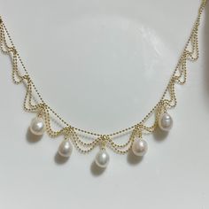 Item Information: -ready to ship -material: 10-11mn teardrop Edison high luster and high quality freshwater pearls, 14k gold plated, brass -length: 40cm + extension 5cm -adjustable length  -due to the nature of freshwater pearls, it has some flaws -come with a gift box Shipping policy: Domestic orders will be shipped via Canada Post with tracking number, should arrive in 3-5 business days, but some delays may occur, please be patient with your order. US orders will be shipped via Canada Post tracked packet, should arrive in 4-13 business days, but some delays may occur, please be patient with your order. Jewelry Care: -avoid exposure to water, liquids, skincare, and cosmetic products -remove when showering, bathing, or swimming  -remove jewelry before going to bed or participating in physi Style Pearl Necklace, Pearl Necklace Bridal, Bracelets Tutorial, Pretty Jewelry Necklaces, Bridal Pearl Necklace, Beaded Jewelry Necklaces, Pearl Necklace Vintage, Beaded Bracelets Tutorial, Wedding Vision