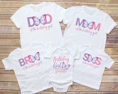 three t - shirts with the words, mom and two babies on them are sitting next to each other