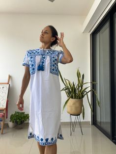 This beatiful Mexican huipil (Mexican kaftan, or tunic) is made by Oaxaca. The huipil is decorated by hand colorful embroidered designs and, 1.5 months of work, each piece is unique. This unique huipil dress gives you an espectacular boho style cool and light to wear. Color: white  organic  cotton with blue embroidered designs  Available in Small Medium Large  XL Other designs here ⬇️  https://www.etsy.com/mx/listing/1337514841/ https://www.etsy.com/mx/listing/1255203719/ https://www.etsy.com/mx/listing/1152461562/ ℹ️Garment care: ⭕️Hand wash with cold water - without vigorous shaking or scrubbing - and neutral soap (if the soap is liquid, it must first be diluted in water so as not to add it directly to the fiber). ❌Do not use spinning. ❌Do not use fabric softener or chlorine bleach. ⭕️Dr Bohemian Handloom Kaftan For Traditional Ceremonies, Handloom Bohemian Kaftan For Traditional Ceremonies, Spring Bohemian Kaftan For Traditional Ceremonies, Huipil Dress, Mexican Huipil, Mexican Boho, Embroidered Designs, Nov 2, 5 Months