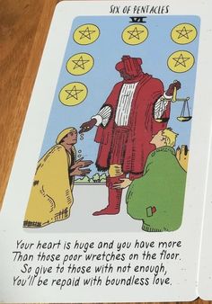 a tarot card with the words six of pentacles written in front of it