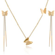 three gold necklaces with butterfly pendants and two long sticks attached to each other