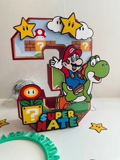 the letter e is for super mario and he's jumping on his own dinosaur