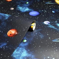 a space themed wallpaper with planets and stars in the background, as well as a tape measure