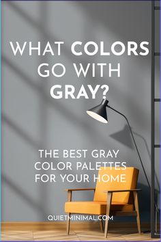 an orange chair in front of a gray wall with the words what colors go with gray?