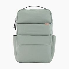 a gray backpack with two pockets on the front