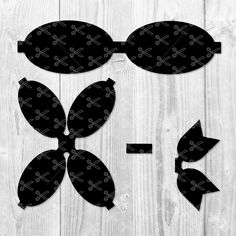 the cut outs are black and white with arrows on them, as well as an arrow