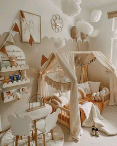 a child's bedroom decorated in neutral colors