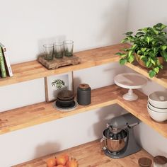 the shelves are filled with various items such as oranges, cups and coffee pots