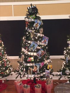 a decorated christmas tree with pictures on it